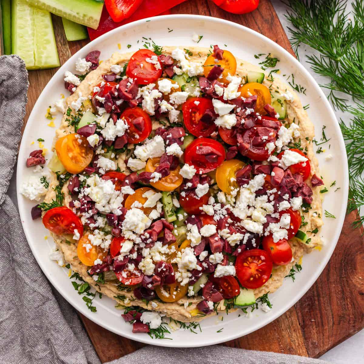 Why This Flavorful Mediterranean Layered Dip Always Disappears First